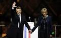             Macron defeats Le Pen and vows to unite divided France
      