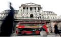             Inflation-wary Bank of England to halt money-printing press
      