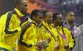             Jamaica break relay record, Farah claims double
      