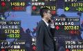             Asian shares retreat dimming outlook for growth
      