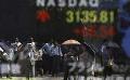             Asian shares rise before German ruling, Fed meeting
      