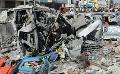             Twin blasts kill 100 in Somalia
      