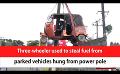             Video: Three-wheeler used to steal fuel from parked vehicles hung from power pole (English)
      