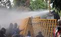             Police fire tear gas and water on protest in Maradana
      