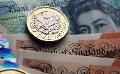             British Pound hits record low against the dollar after tax cut plans
      
