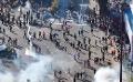             Police fire tear gas on massive NPP protest in Colombo
      