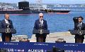             US, UK and Australia agree on nuclear submarine project
      