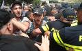             Georgia Pride festival in Tbilisi stormed by right-wing protesters
      